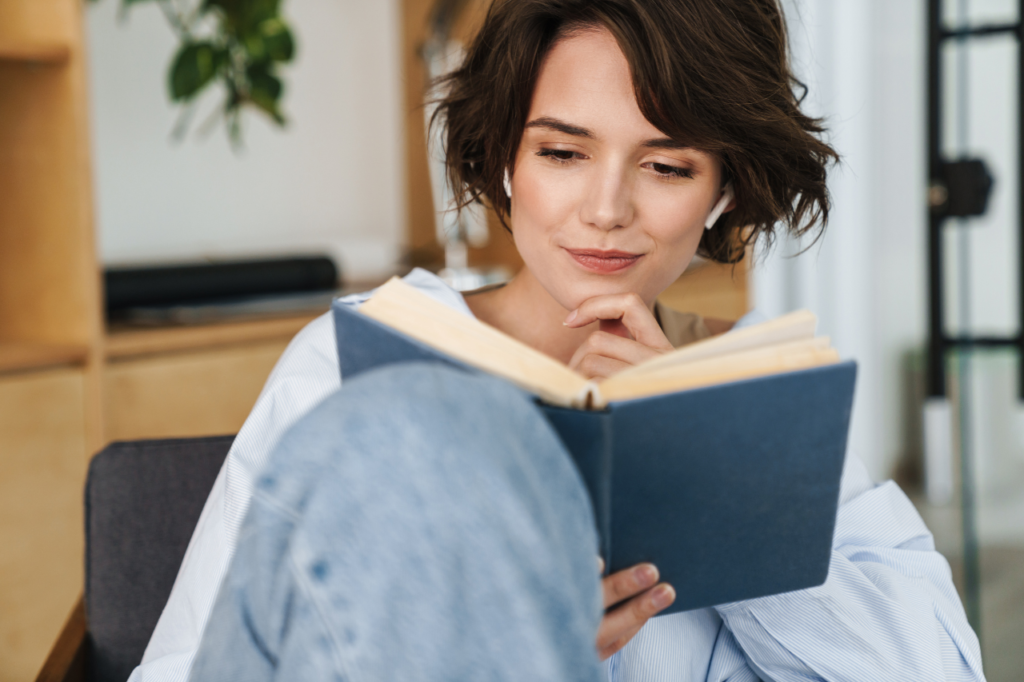 Women reading open book